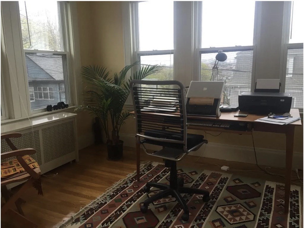 30 Lawrence Street, Unit 2 Everett, MA 02149 - Photo 9 of 13 a view of workspace with wooden floor