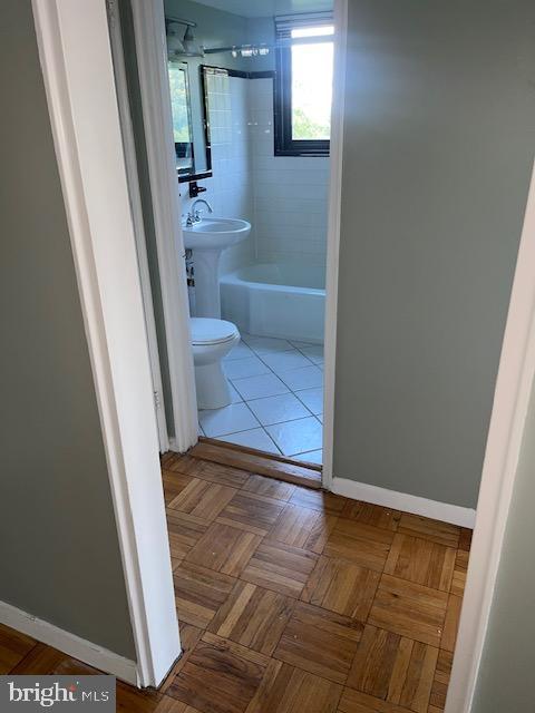 3601 Wisconsin Avenue Northwest, Unit 309 Washington, DC 20016 - Photo 11 of 14 a bathroom with a sink and a toilet