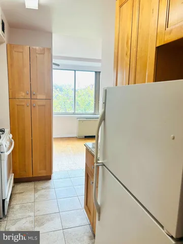 a view of walk in closet with window