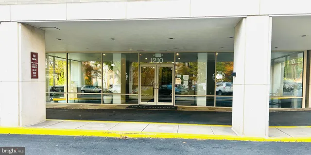 a view of swimming pool with outdoor seating