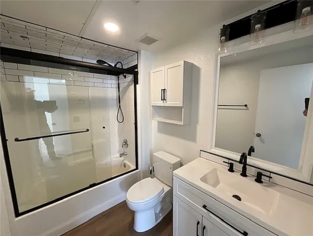 20000 Plum Canyon Road, Unit 225 Saugus, CA 91350 - Photo 6 of 12 a bathroom with a sink mirror toilet and shower