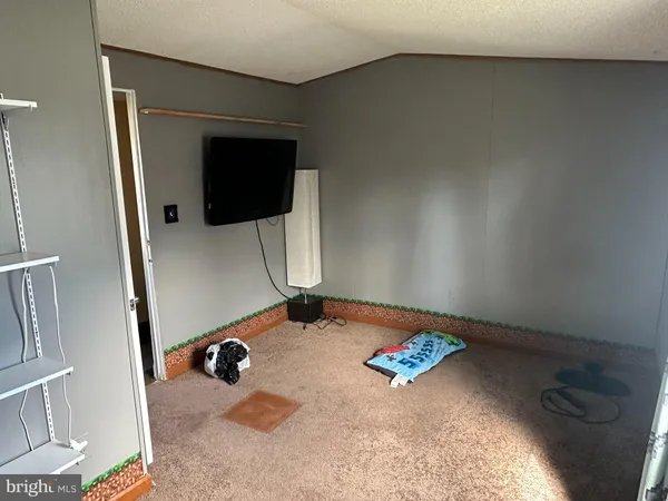a wooden door in front of a house