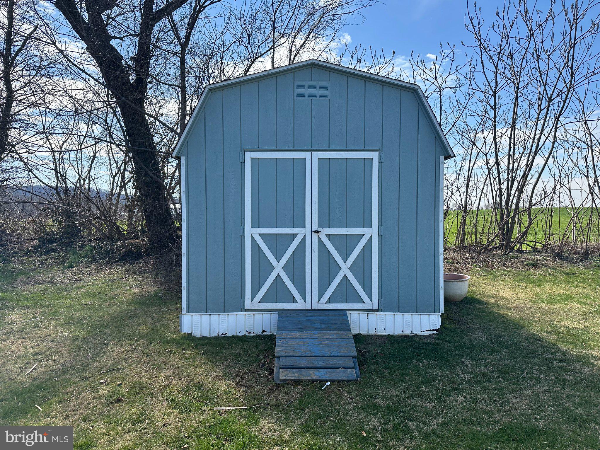 10 Roth Avenue Mertztown, PA 19539 - Photo 17 of 21 a wooden door in front of a house
