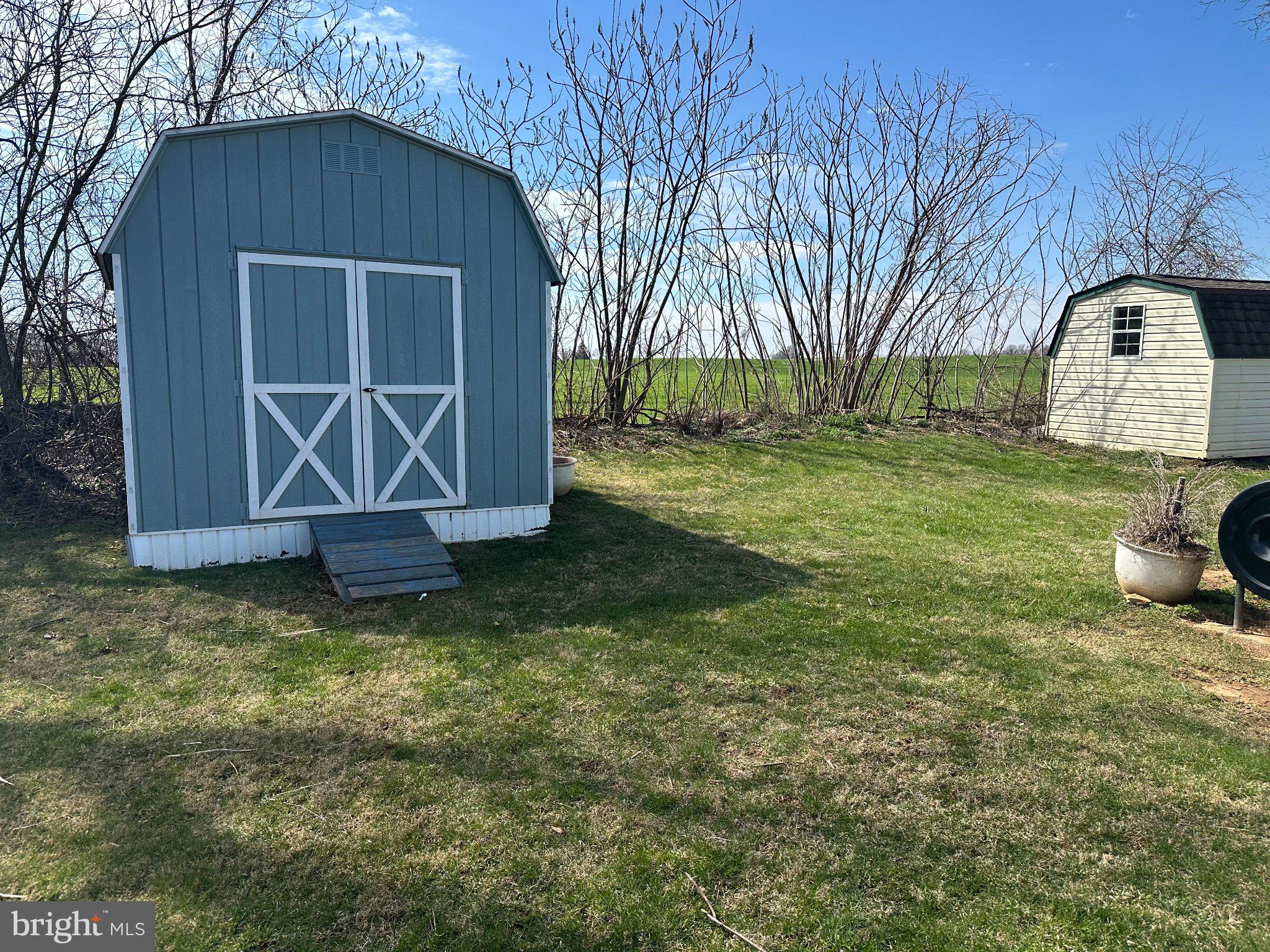 10 Roth Avenue Mertztown, PA 19539 - Photo 19 of 21 a front view of a house with garden
