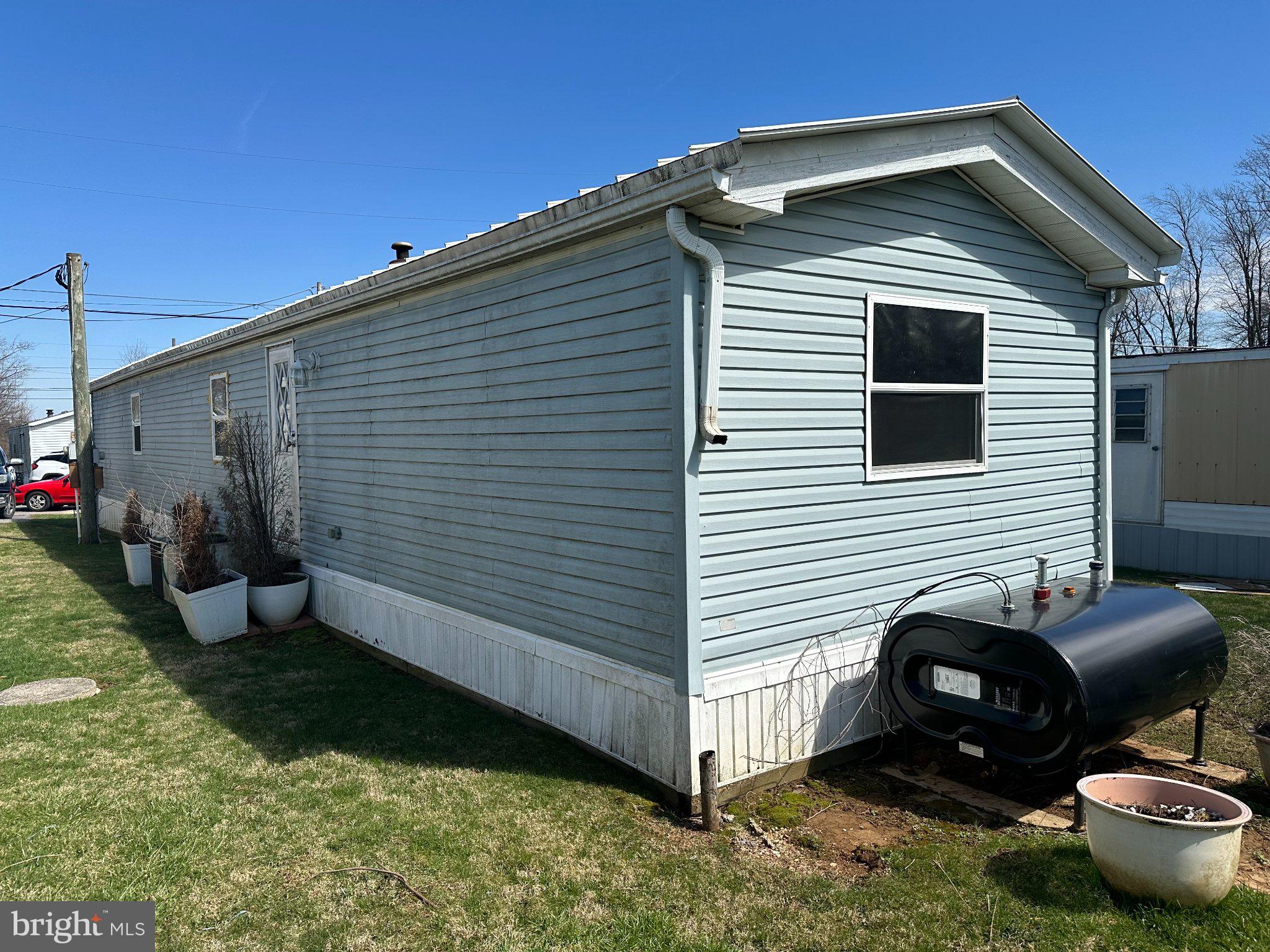 10 Roth Avenue Mertztown, PA 19539 - Photo 21 of 21 a front view of a house with garden