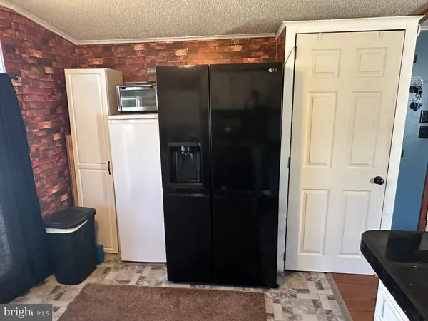 a view of livingroom with furniture and windows