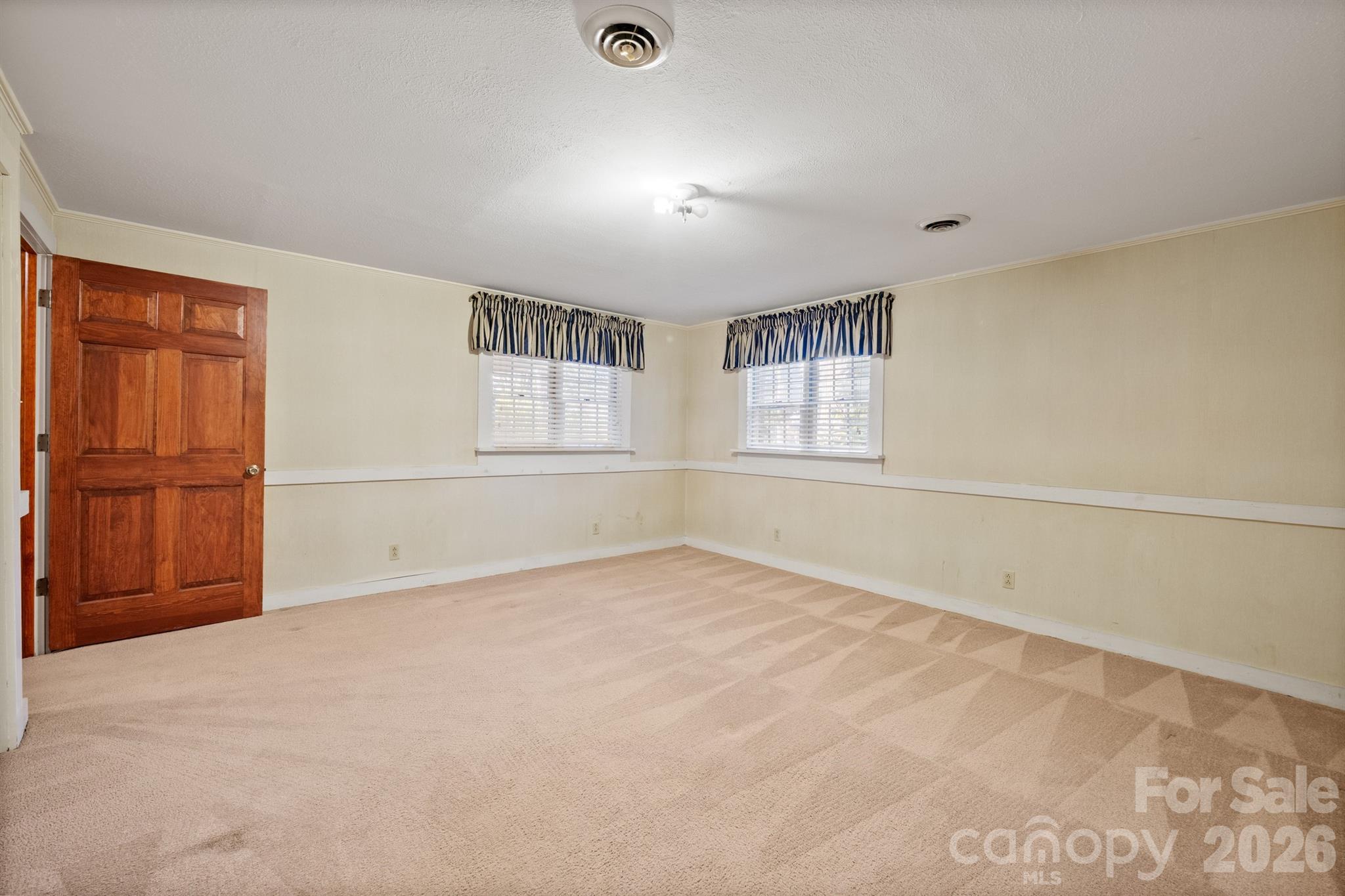 482 Miller Farm Road Statesville, NC 28625 - Photo 24 of 46 an empty room with windows and cabinet