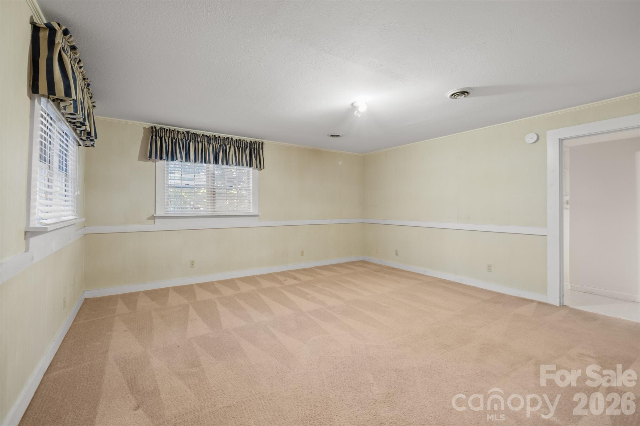 482 Miller Farm Road Statesville, NC 28625 - Photo 25 of 46 an empty room with windows and closet