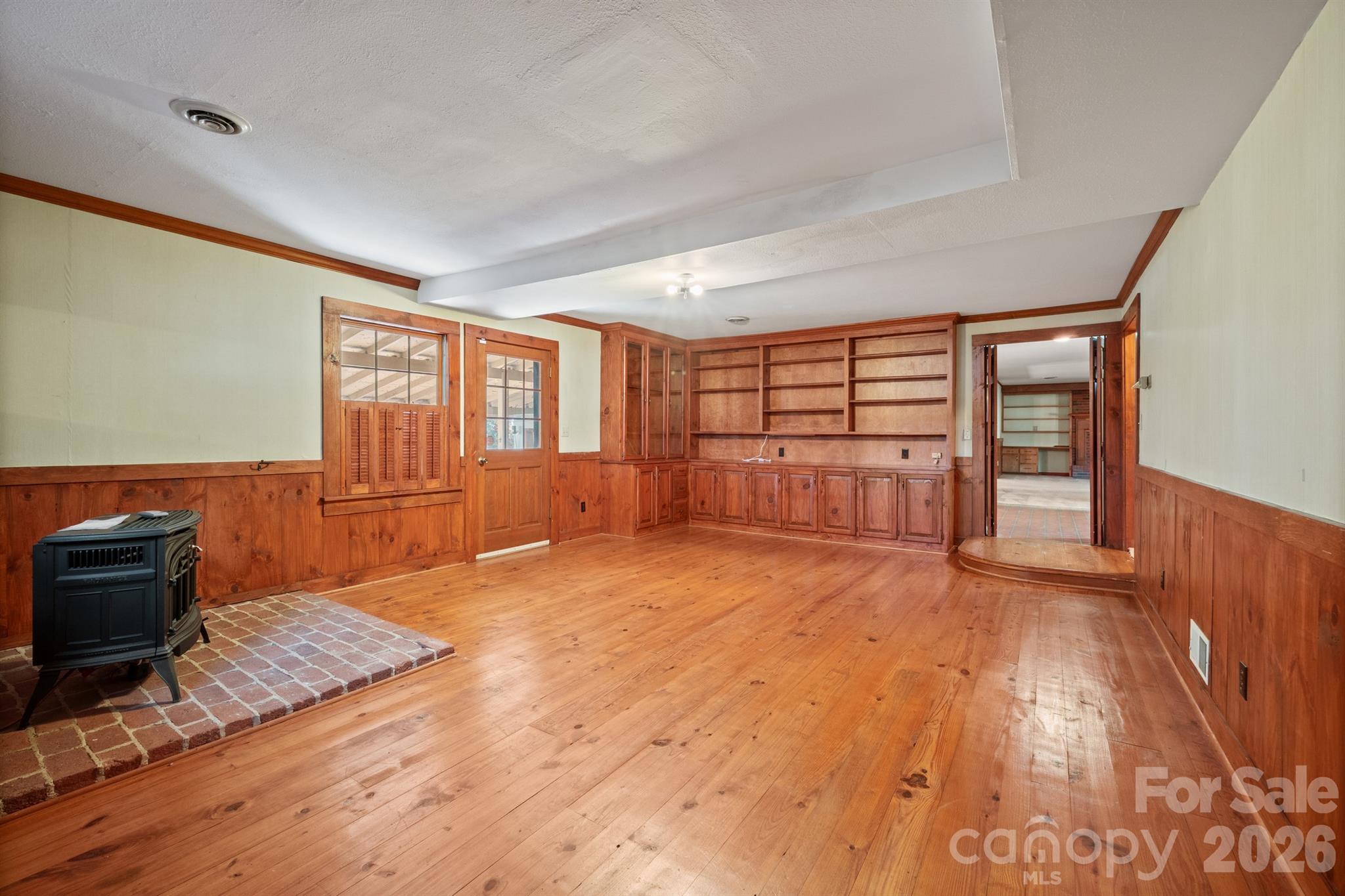 482 Miller Farm Road Statesville, NC 28625 - Photo 29 of 46 a big room with wooden floor and windows
