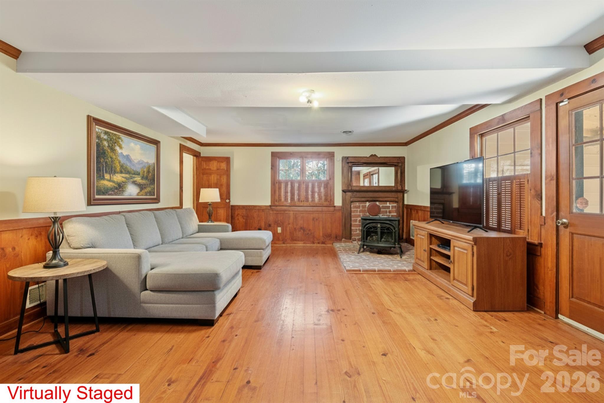 482 Miller Farm Road Statesville, NC 28625 - Photo 31 of 46 a living room with furniture and a flat screen tv