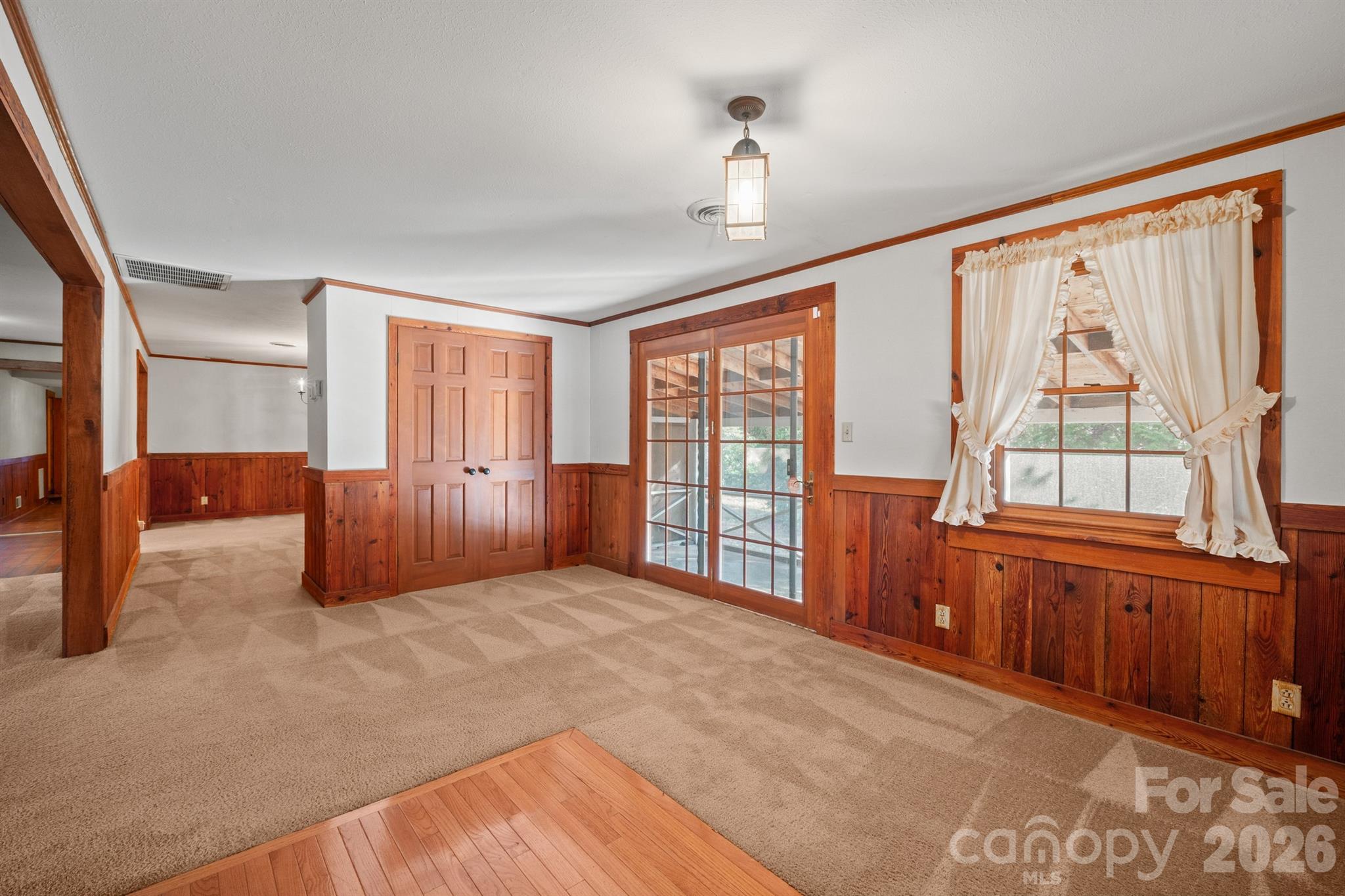 482 Miller Farm Road Statesville, NC 28625 - Photo 32 of 46 a large bedroom with a large bed and wooden floor