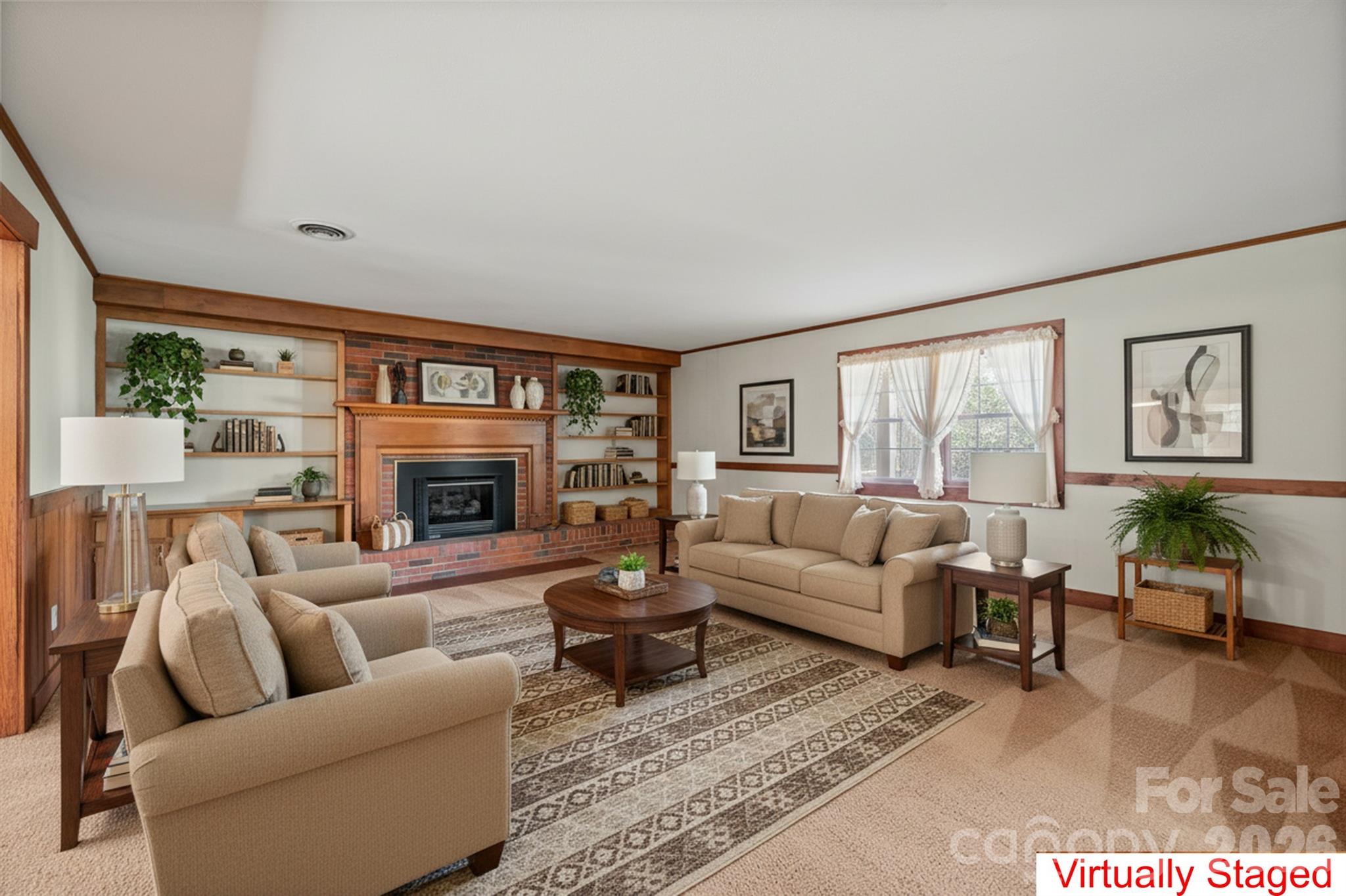 482 Miller Farm Road Statesville, NC 28625 - Photo 37 of 46 a living room with furniture a large window and a fireplace