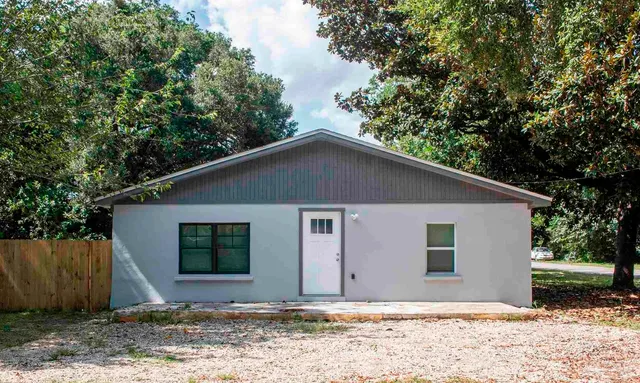a front view of house with yard