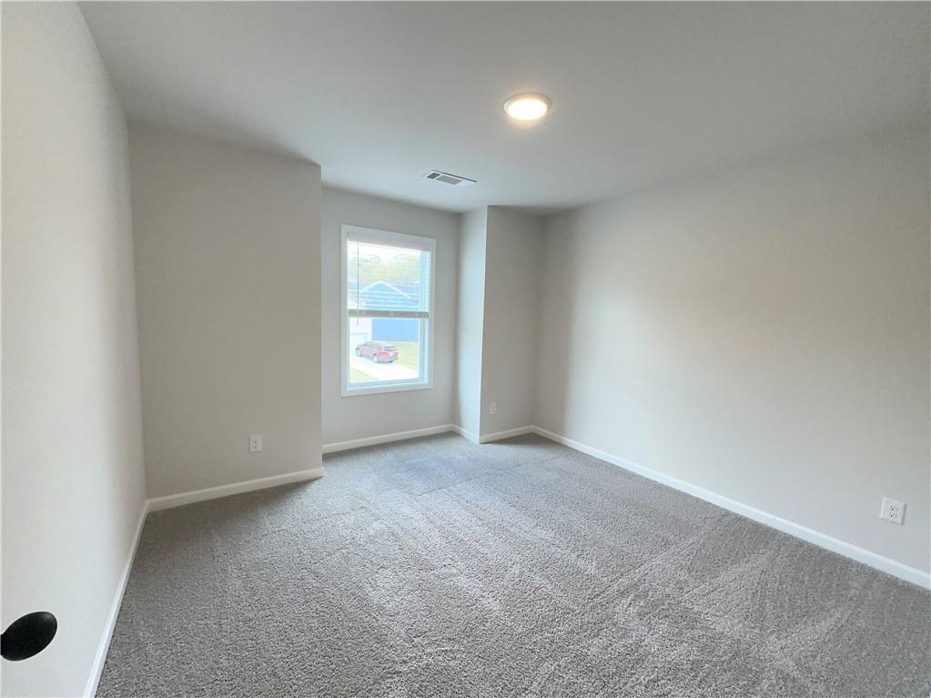 345 Rodeo Drive Auburn, GA 30011 - Photo 20 of 22 an empty room with windows