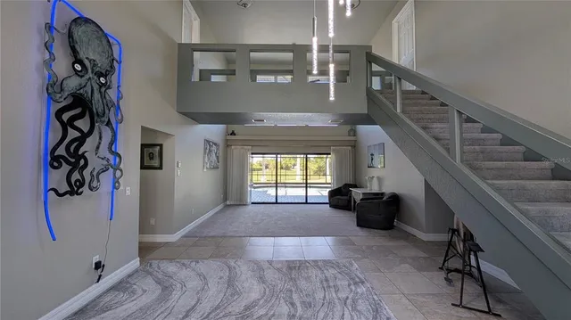 a view of livingroom with furniture and windows