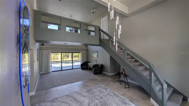 a view of an entryway with a workspace