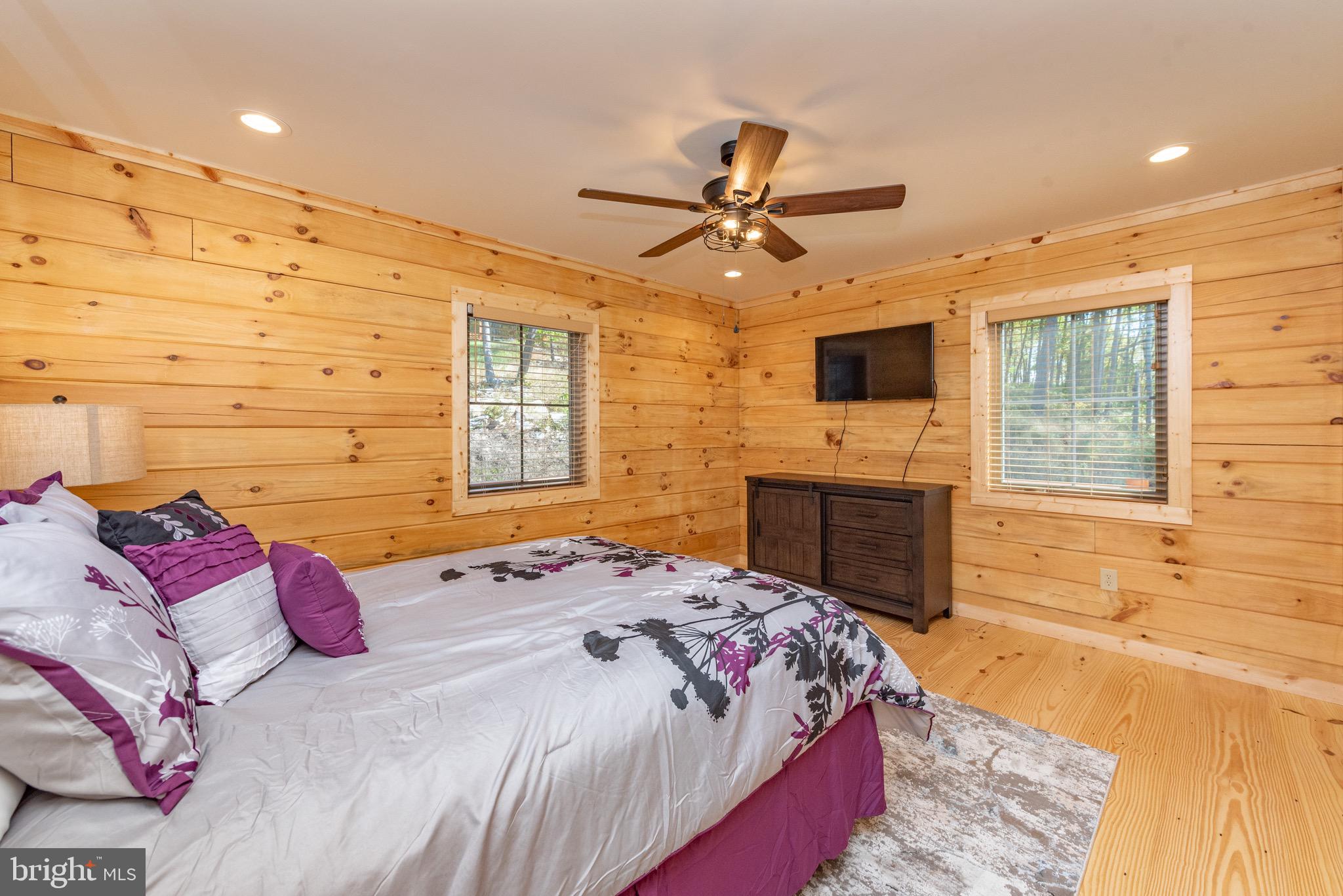 37 Ridgeline Trail McHenry, MD 21541 - Photo 22 of 59 a bedroom with a bed dresser and a window