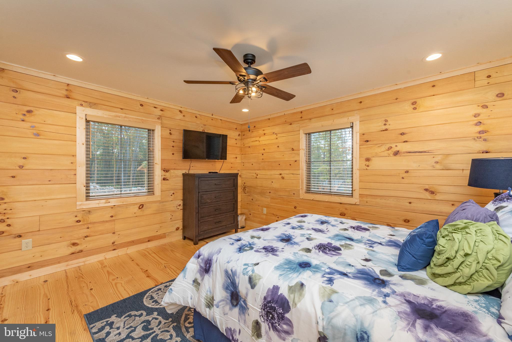 37 Ridgeline Trail McHenry, MD 21541 - Photo 26 of 59 a bedroom with a bed and wooden floor