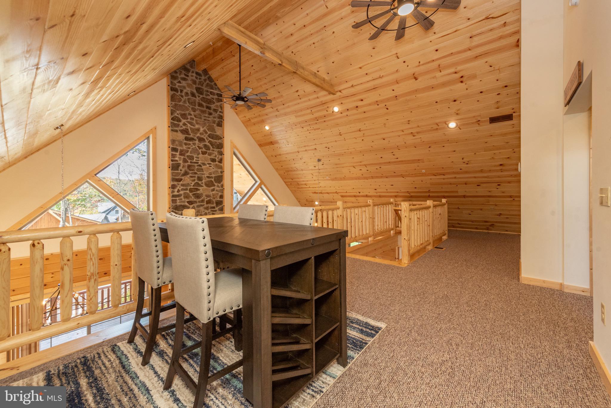 37 Ridgeline Trail McHenry, MD 21541 - Photo 31 of 59 a view of a balcony with chairs and iron stairs