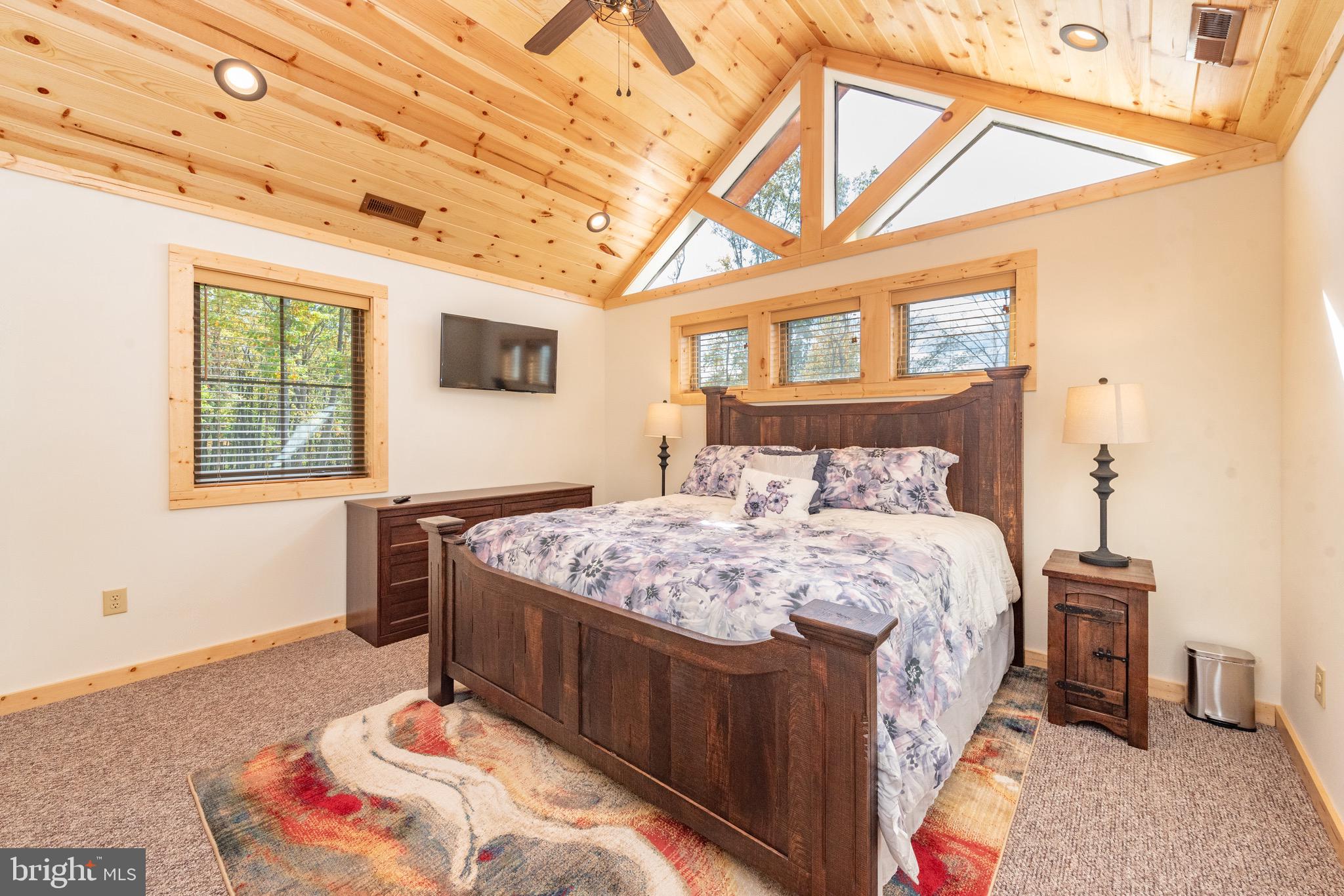 37 Ridgeline Trail McHenry, MD 21541 - Photo 39 of 59 a bedroom with a bed and a window