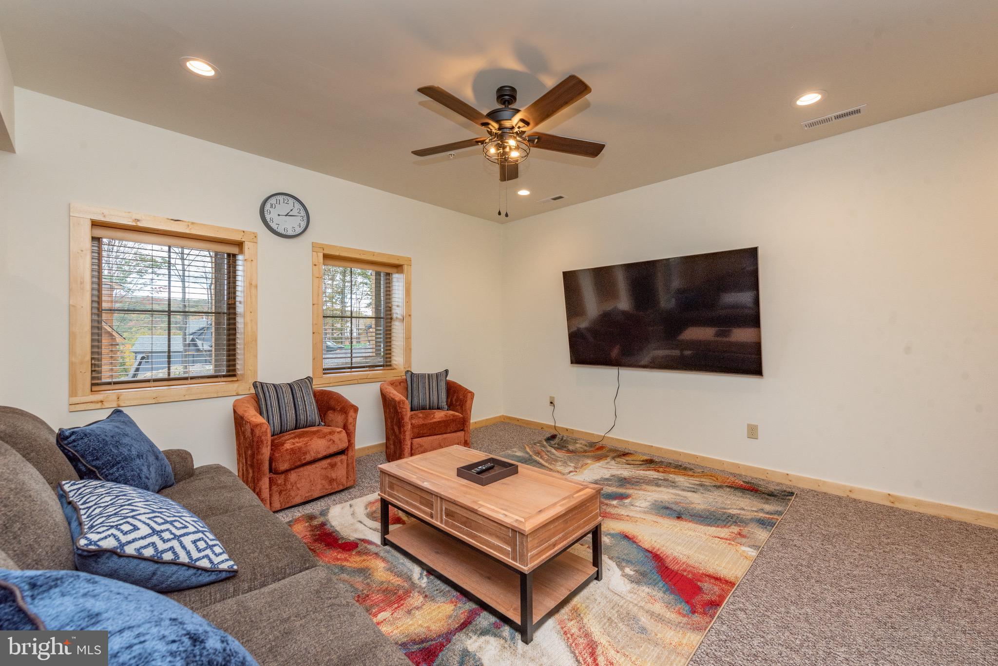 37 Ridgeline Trail McHenry, MD 21541 - Photo 44 of 59 a living room with furniture and a flat screen tv