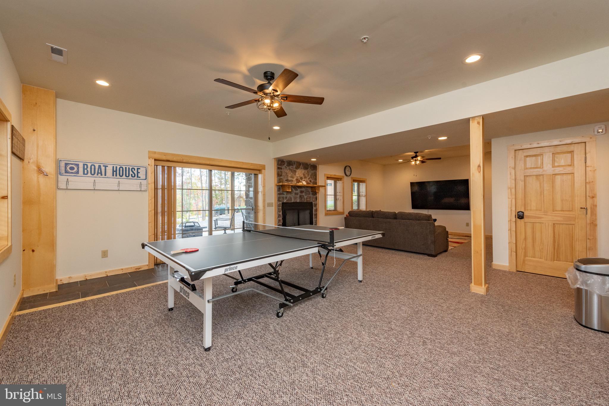 37 Ridgeline Trail McHenry, MD 21541 - Photo 53 of 59 a living room with furniture a dining table and chairs