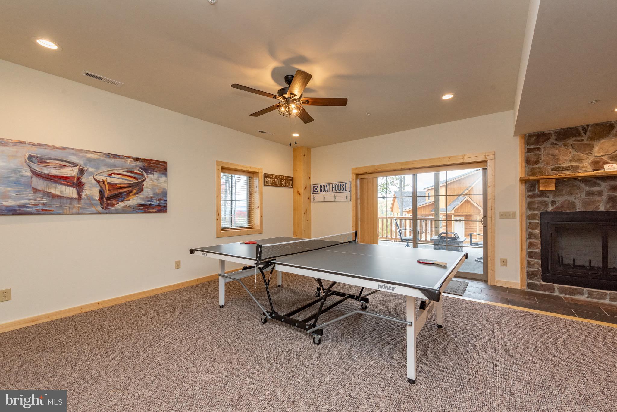 37 Ridgeline Trail McHenry, MD 21541 - Photo 54 of 59 a view of a livingroom with furniture and a ceiling fan