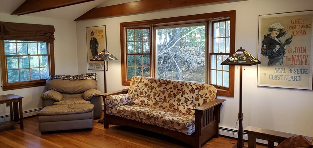 250 Concord Road Wayland, MA 01778 - Photo 7 of 16 a living room with furniture and a large window