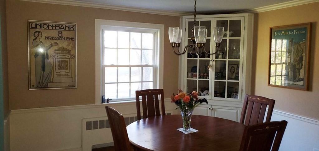 250 Concord Road Wayland, MA 01778 - Photo 8 of 16 a view of a dining room with furniture window and wooden floor