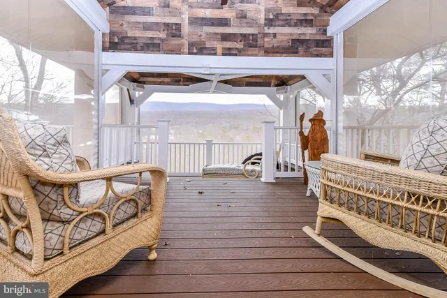 a kitchen with a sink window and cabinets