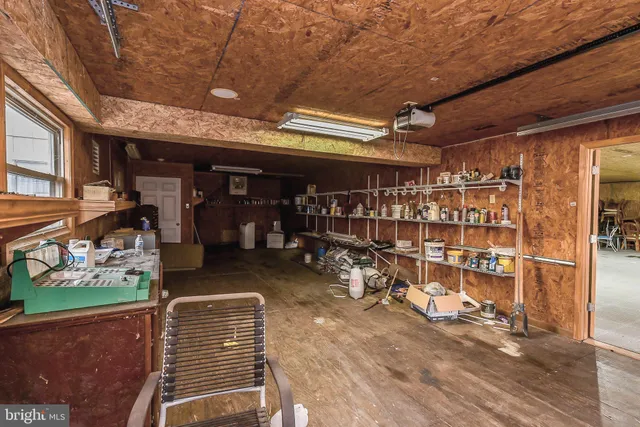 a view of a park with iron fence