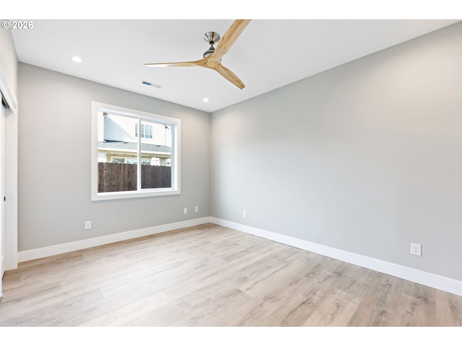 3547 West 2nd Street Washougal, WA 98671 - Photo 36 of 45 a view of an empty room with wooden floor and a window