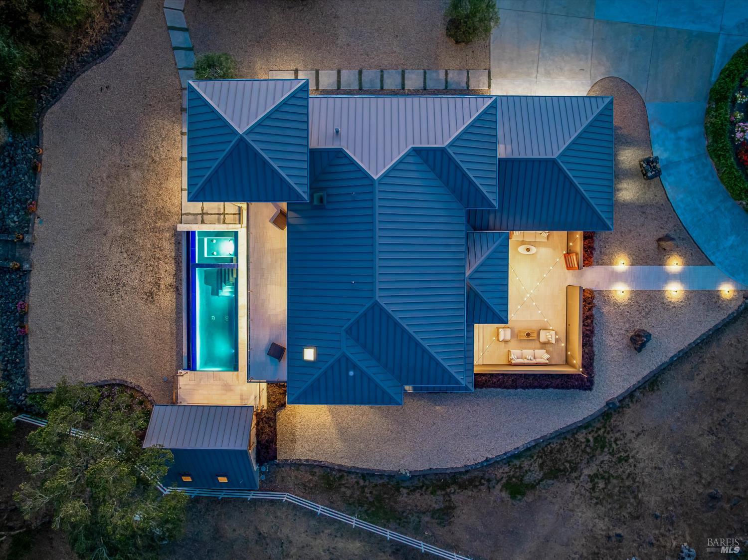 2929 Atlas Peak Road Napa, CA 94558 - Photo 55 of 56 an aerial view of a house with a yard and potted plants