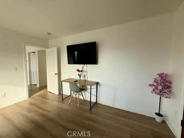 a view of a livingroom with a flat screen tv