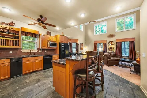 a large bathroom with double vanity and a mirror
