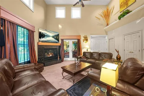 a bed room with a bed and a chandelier