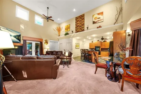 a spacious bathroom with a double vanity sink a mirror and a bathtub