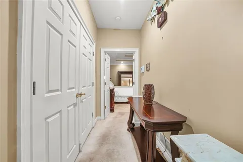 a view of a livingroom with furniture and a window