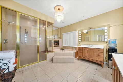 a view of a hallway with paintings on the wall