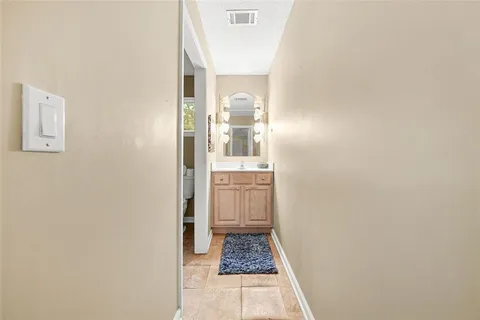 a view of a front of a house with a yard