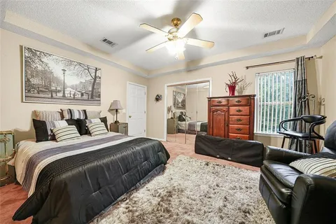 a view of a house with a back yard