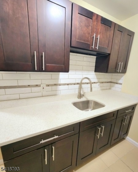 350 13th Avenue Newark, NJ 07103 - Photo 3 of 6 a kitchen with a sink and cabinets