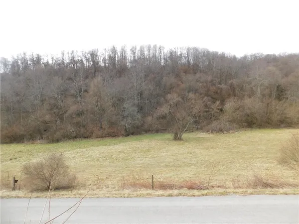 a view of a swimming pool and mountain view