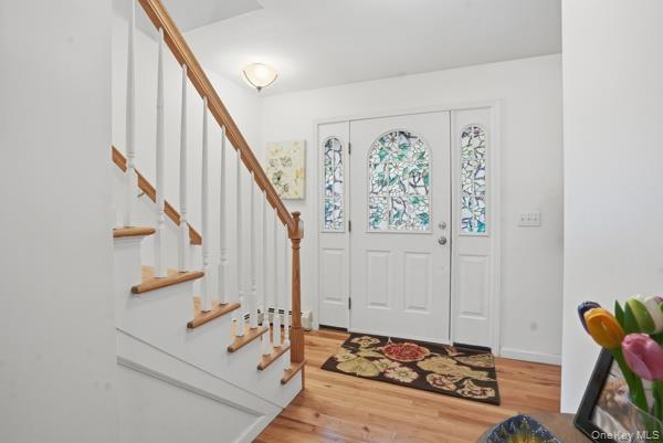 29 Hickory Hill Road Newburgh, NY 12550 - Photo 7 of 47 a view of front door with dining room and stairs
