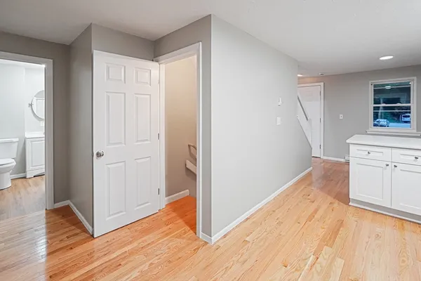 a view of a kitchen from the hallway