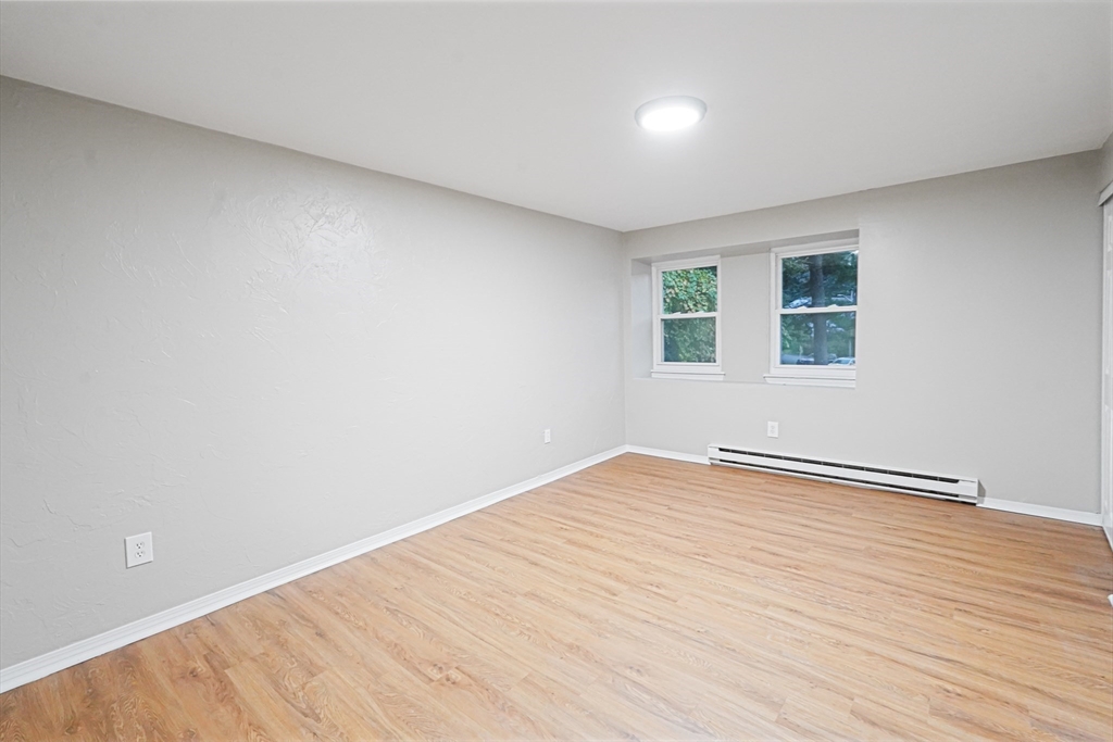 7 Debra Lane, Unit 1 Bellingham, MA 02019 - Photo 18 of 25 wooden floor in a room