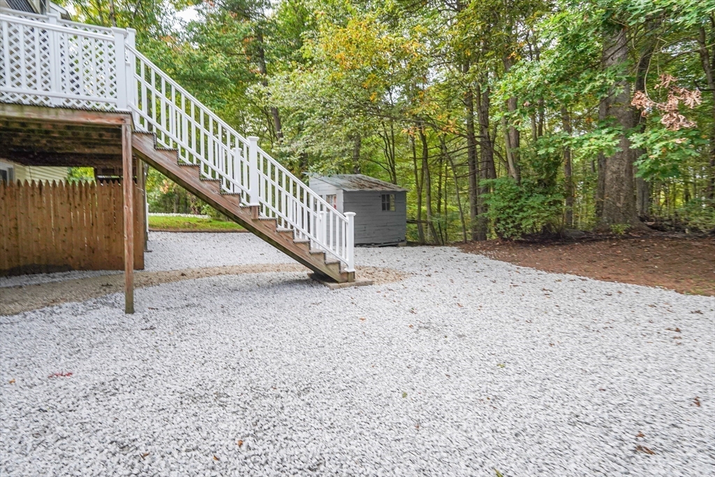 7 Debra Lane, Unit 1 Bellingham, MA 02019 - Photo 4 of 25 a view of a house with a yard