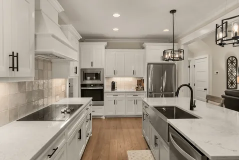 a bathroom with a sink toilet and mirror