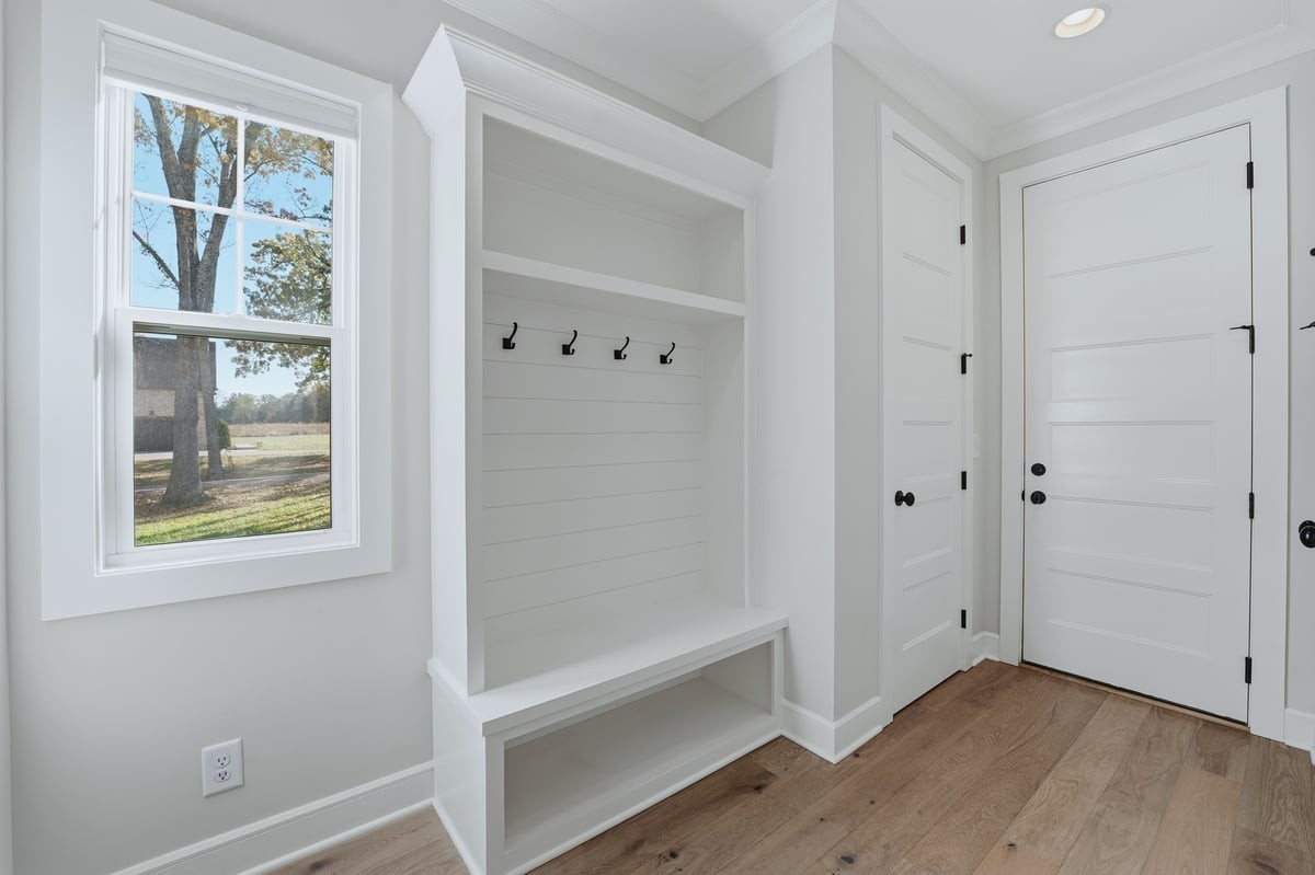 1497 Phillips Road Lebanon, TN 37087 - Photo 28 of 53 a view of an empty room with wooden floor and a window