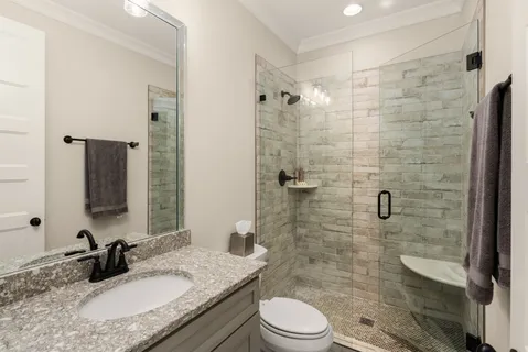 a view of an empty room with a large window